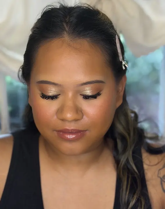 Warm bronze glam with a nude lip